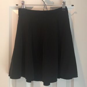 Brandy Melville silky black paneled skater skirt